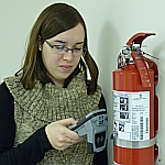 Reading an RFID tag on a fire extinguisher